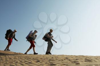 Royalty Free Photo of a Three People Hiking