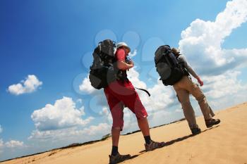 Royalty Free Photo of Hikers in the Desert