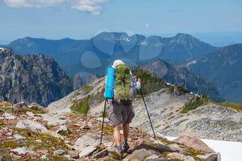 Royalty Free Photo of a Hiker in the Mountains