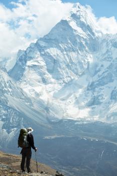 Royalty Free Photo of a Hiker in the Himalayan Mountains