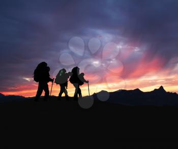 Royalty Free Photo of Hikers at Sunset