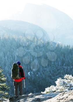 Royalty Free Photo of a Hiker in the Mountains