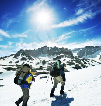 Royalty Free Photo of a People Hiking in the Mountains