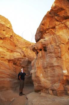 Royalty Free Photo of a Man Standing in a Canyon in Egypt