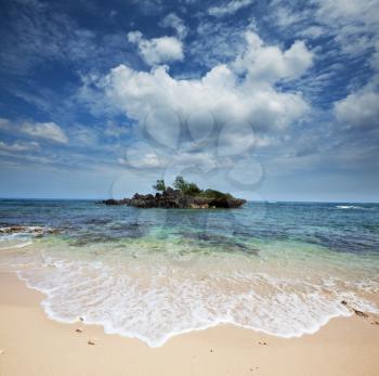 Royalty Free Photo of a Small Island in the Ocean