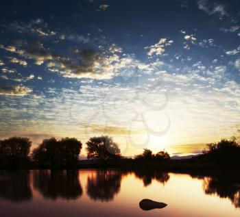 Royalty Free Photo of a Lake at Sunset