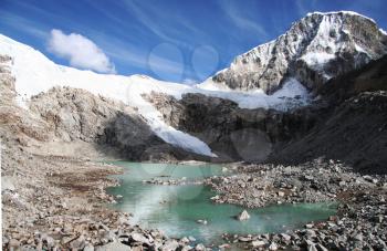 Royalty Free Photo of a Lake and Clouds in the Cordilleras