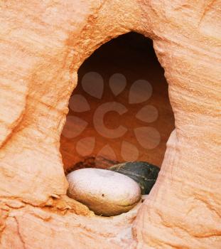 Royalty Free Photo of a Pebble in a Cave