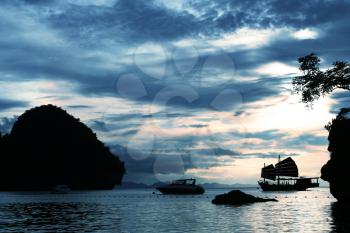 Royalty Free Photo of Silhouettes of Boats in the Sea