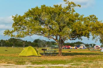 tent on green grassland