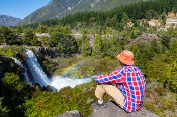 Man in hike in volcanoes region (Araucania) in Chile, South America