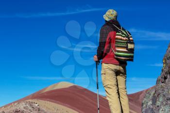 Hiking scene in Vinicunca, Cusco Region, Peru. Montana de Siete Colores,  Rainbow Mountain.