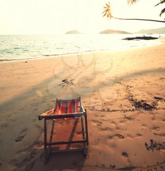 Sandy beach in ocean coast. Travel background.