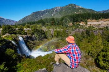 Man in hike in volcanoes region (Araucania) in Chile, South America