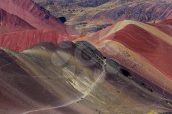 Hiking scene in Vinicunca, Cusco Region, Peru. Montana de Siete Colores,  Rainbow Mountain.