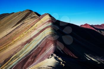 Hiking scene in Vinicunca, Cusco Region, Peru. Montana de Siete Colores,  Rainbow Mountain.