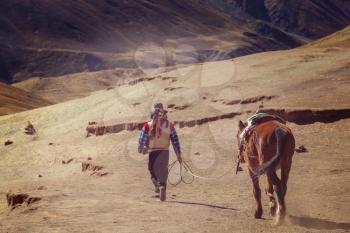 Hiking scene in Vinicunca, Cusco Region, Peru. Montana de Siete Colores, Rainbow Mountain.