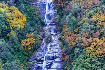 Picturesque autumn waterfall