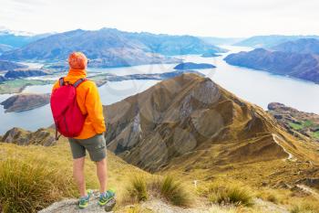 Traveler hiking in Roys Peak. New Zealand. Lake Wanaka