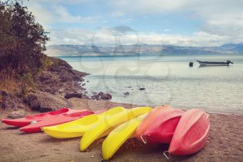 Kayak on lake shore, Patagonia, Chile.