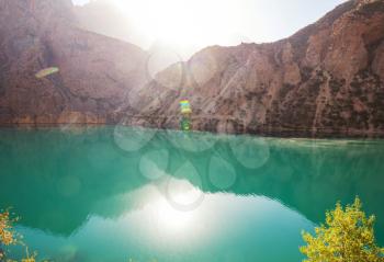 Beautiful serene lake in  Fanns mountains (branch of Pamir) in Tajikistan.