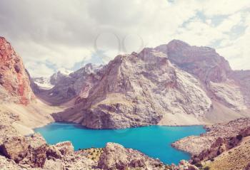 Beautiful serene lake in  Fanns mountains (branch of Pamir) in Tajikistan.