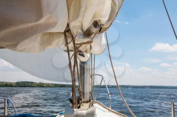 Sailing yacht on big river