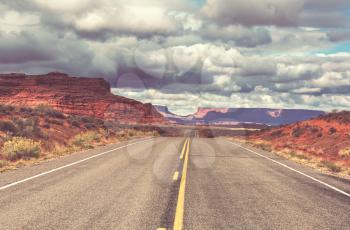 Road in the prairie country. Deserted natural travel background.