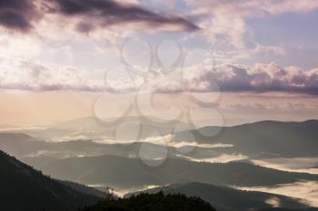 Mountains silhouette at sunrise. Beautiful natural background.