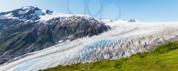 Glaciers in Alaska in cloudy weather.  Amazing panorama mountains landscape