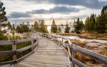 Wooden boardwalks on the geothermal areas of Yellowstone National park, Wyoming, USA