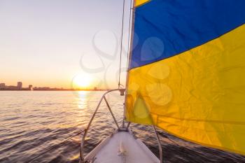 Sailing yacht on big river