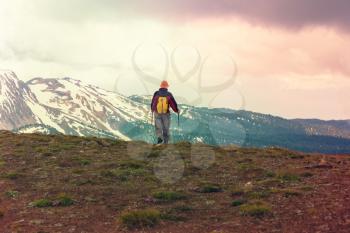 Hiking man in the mountains