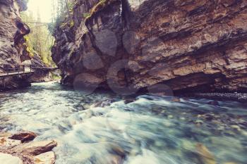 Johnston Canyon in Banff NP, Canada. Beautiful natural landscapes in British Columbia. Summer season.