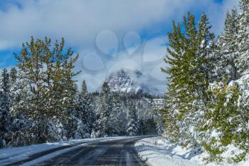 Early winter with first snow covering rocks and woods in the Glacier National Park, Montana, USA
