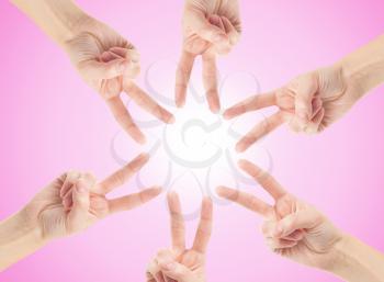 Hands of teamwork , forming the star shape