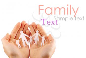 Paper family in hands isolated on white background