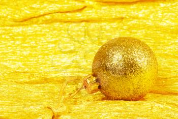 Christmas ball on golden background