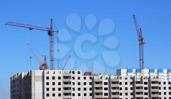  crane and blue sky on building site
