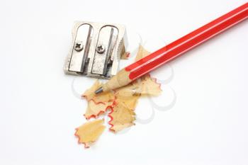 shot of eraser, pencil and pencil metal double sharpener on a white background