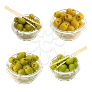 Set green olives in a bowl on a white background