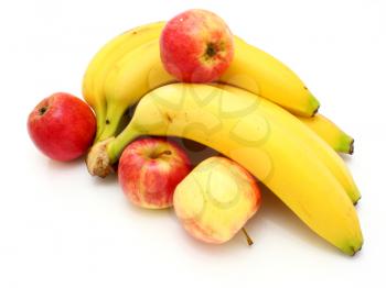 Yellow bananas apples and pears a still-life on a white background