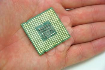 Computer processor in hand