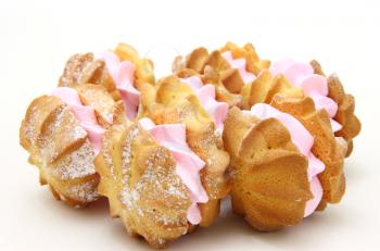 Yellow cookies with a  stuffing  on a white background 