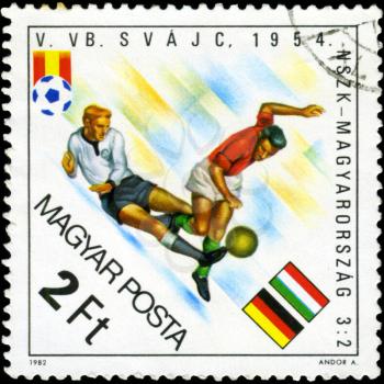 HUNGARY - CIRCA 1982: A stamp printed in Hungary, shows football players, inscription Germany - Hungary 3:2, 1954, circa 1982