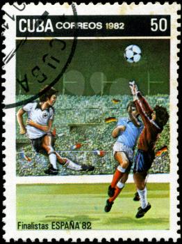 CUBA - CIRCA 1982: A post stamp printed in Cuba shows shows football, series devoted World Cup in Spain, circa 1982.