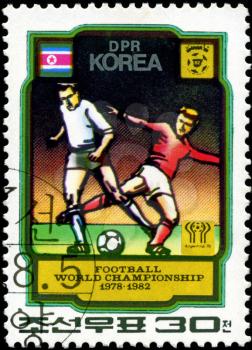 NORTH KOREA - CIRCA 1978: a stamp printed by North Korea shows football players. World football cup in Argentina, circa 1978