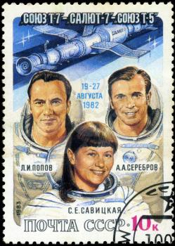 USSR - CIRCA 1983: A post stamp printed in USSR (Russia), shows astronauts Popov, Serebrov and Savitskaya with inscriptions and name of series Soyuz T-7, Salyut 7, Soyuz T-5 Space Flight, circa 1983