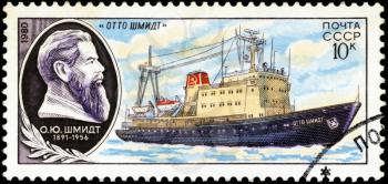 USSR - CIRCA 1980: A stamp printed in USSR (Russia) shows Portrait of a scientist and a ship his name with inscription Otto Shmidt, from the series Soviet Scientific Research Ships, circa 1980
