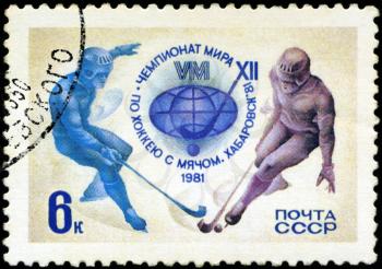 USSR - CIRCA 1981: A stamp printed in the USSR shows two hockey players, devoted world championship on hockey with ball in Khabarovsk, circa 1981